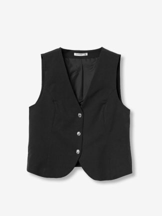 chaleco-sastre-mujer-negro-pantalón-conjunto-look-otoño-casual